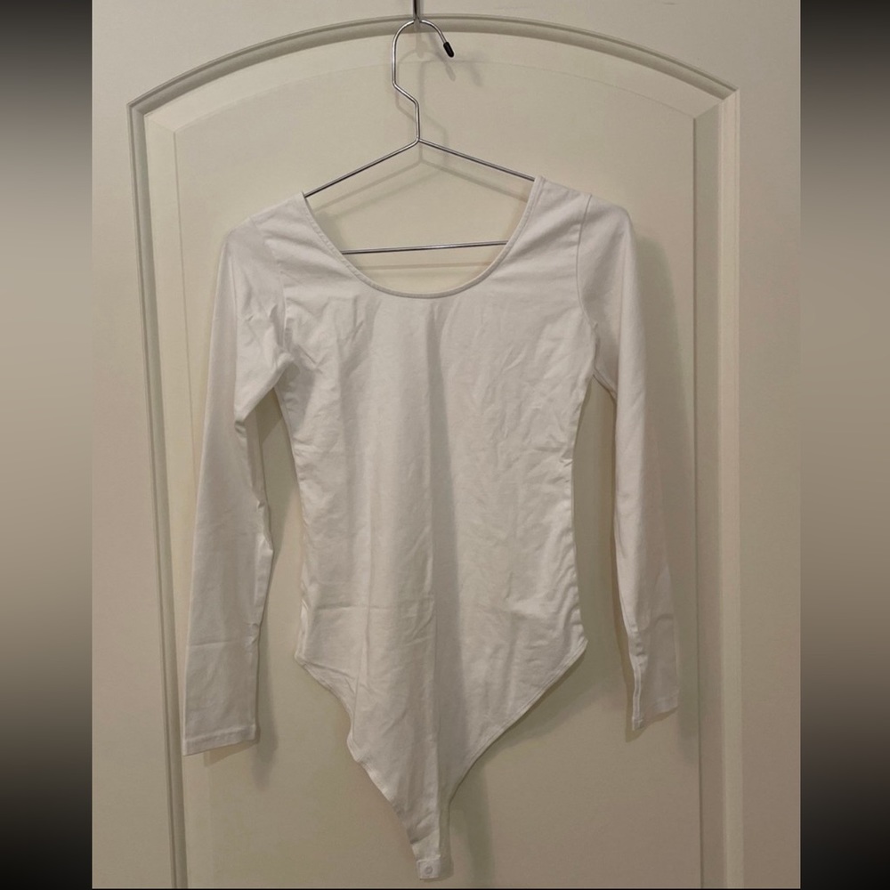 White scoop-neck longsleeve bodysuit